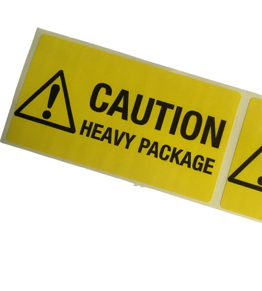 Caution Heavy Package Labels - Bright yellow with black text and warning triangle